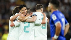 Joe Bell, Marko Stamenić, Tim Payne and Chris Wood of New Zealand celebrate Payne's goal during the FIFA World Cup 2026 OFC Qualifier Semi Final match between New Zealand All Whites and Fiji at Sky Stadium on March 21, 2025 in Wellington, New Zealand. (Photo by Hagen Hopkins/Getty Images)