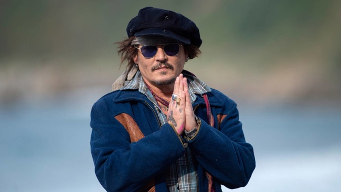 Johnny Depp's debut art collection sold out within hours earning the actor over $5.8 million. Photo / Getty Images