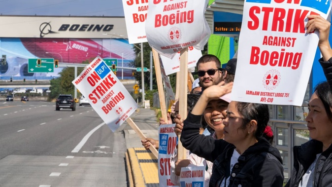 Workers picketing outside a Boeing facility during a strike in Everett, Washington, in September. Photo / M. Scott Brauer, Bloomberg via Getty Images