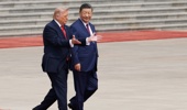 President Donald Trump and Chinese President Xi Jinping attend a welcome ceremony at the Great Hall of the People on May 14, 2026 in Beijing, China. President Trump is meeting with President Xi Jinping in Beijing to address the Iran conflict, trade imbalances, and the Taiwan situation while establishing new bilateral boards for economic and AI oversight. (Photo by Alex Wong/Getty Images)