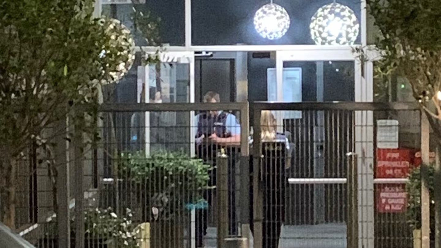 Police responding to a report of an assault on Day St last night. Photo / Supplied