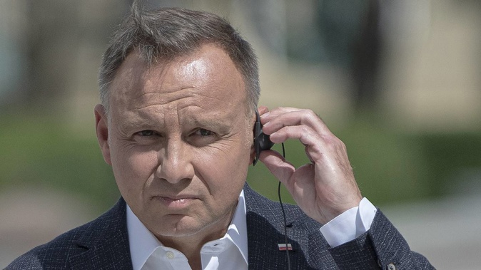 Russian comedians pretending to be the French president tricked the Polish president, Andrzej Duda, into giving them sensitive information after a missile exploded in eastern Poland last week. Photo / Andrew Kravchenko, AP, File