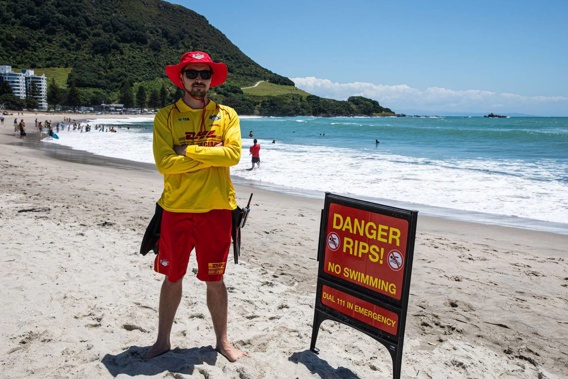Chaz Gibbons-Campbell, Surf Lifesaving NZ's Eastern Region's lifesaving manager, on patrol at Mount Maunganui beach near Leisure Island. Photo / Mead Norton