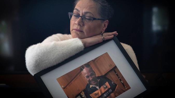 Tanya Anderson embraces a photo of her soulmate Richie Martin, who was killed after being hit by a car while crossing the road. Photo / Andrew Warner