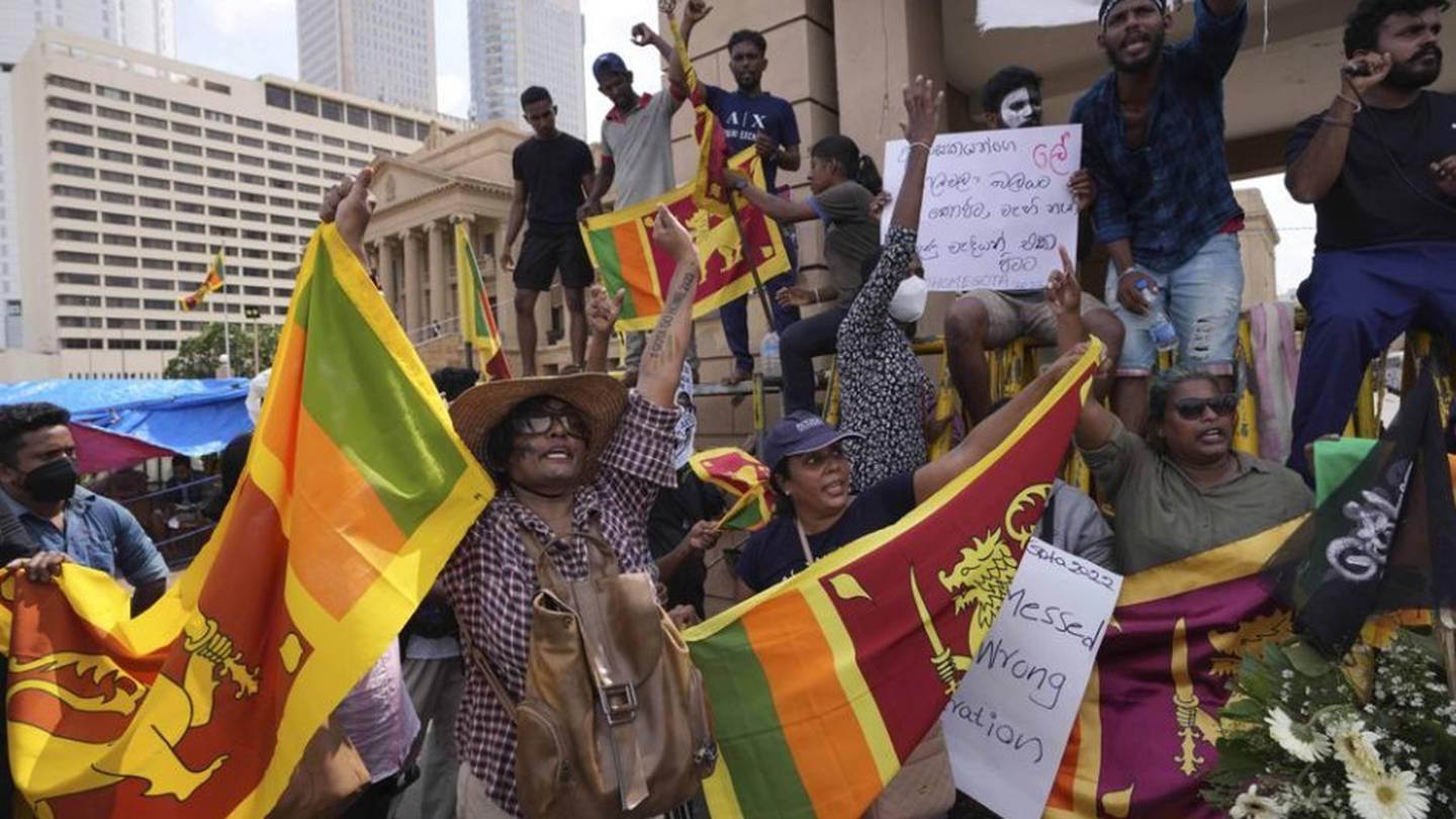 Sri Lankans shout slogans at the ongoing protest site against the economic crisis outside the president's office in Colombo, Sri Lanka. (Photo / AP)