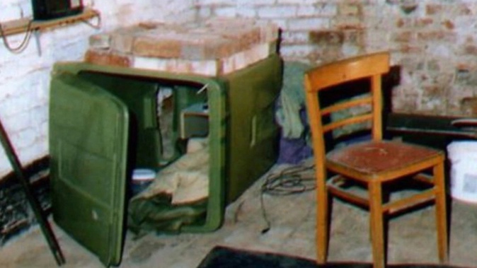 Stephanie was kept in a coffin, inside this green wheelie bin for eight days. Photo / East Midlands Police Handout