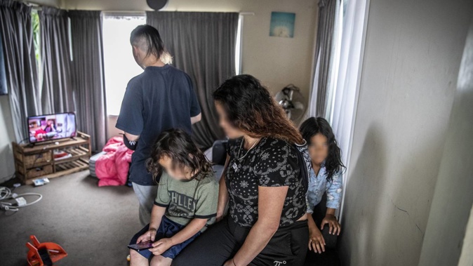 The family was relocated to a Takapuna motel after a fire at their Ranui Kainga Ora home. Photo / Michael Craig