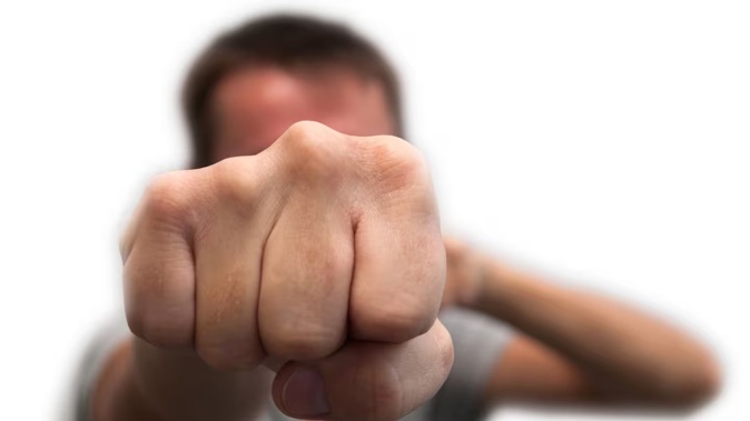 A man who punched a woman in the face as she was driving and then suggested that she kill herself claimed she had no visible injuries. Photo / 123RF