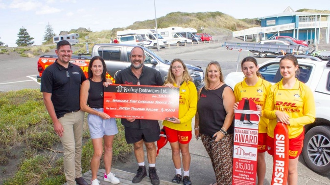 Shaun Libeau, chairman of Wanganui Lifeguard Service Inc, and Bex Sharratt, communications officer, Juan Coffey (JJ Roofing), Sophie Smith (lifeguard), Janelle Coffey (JJ Roofing), Greta Cox (lifeguard) and Lucy Reid (lifeguard).