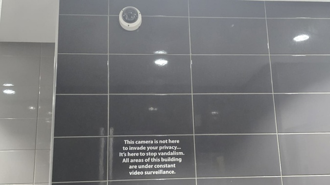 The camera on the wall of the McDonald's restaraunt.