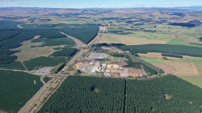 Karioi pulpmill in the foreground and Tangiwai sawmill in the distance, both of which are under an operational pause.