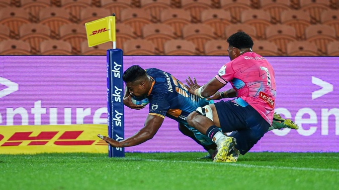 Moana Pasifika midfielder Julian Savea scores his record-breaking try against the Melbourne Rebels at FMG Stadium Waikato. Photo / Photosport