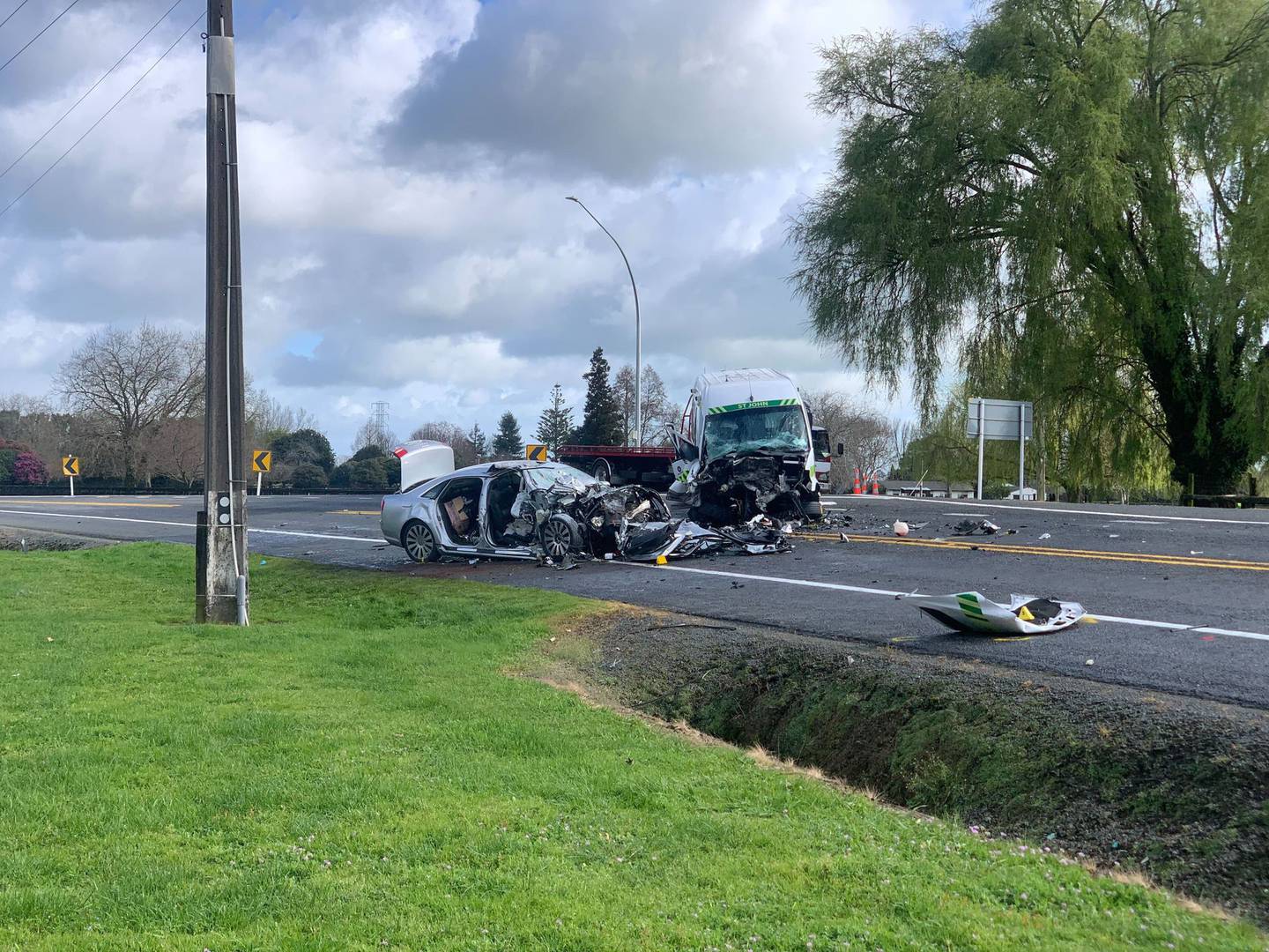The crash between a car and an ambulance on State Highway 1 near Cambridge killed the Audi driver and two St John staff were injured. Photo / Caitlan Johnston