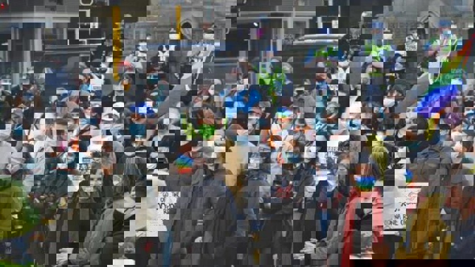 Counter-protesters in the Octagon demonstrate against a march by the Freedom and Rights Coalition. Photo / Gregor Richardson