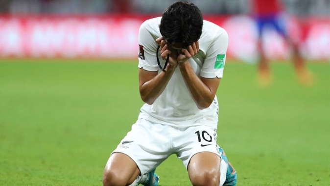 Marko Stamenic of New Zealand looks dejected following their side's defeat to Costa Rica. Photo / Getty