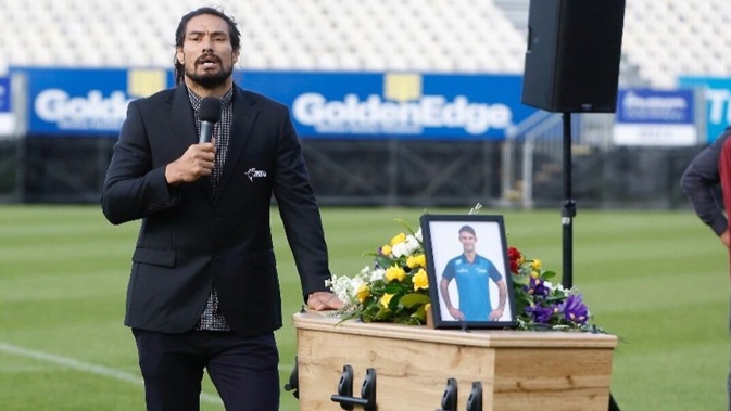 Shane Christie, pictured speaking at the service for his friend Bill Guyton, who took his life and was found through an autopsy to have the brain injury, CTE.