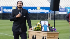 Shane Christie, pictured speaking at the service for his friend Bill Guyton, who took his life and was found through an autopsy to have the brain injury, CTE.