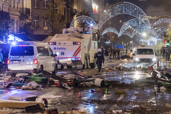 Police had to seal off parts of the center of Brussels and moved in with water cannons and tear gas to disperse crowds. Photo / AP
