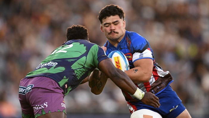 Du'Plessis Kirifi of the Hurricanes charges forward during the round five Super Rugby Pacific match between Highlanders and Hurricanes at Forsyth Barr Stadium, on March 14, 2025, in Dunedin, New Zealand. (Photo by Joe Allison/Getty Images)