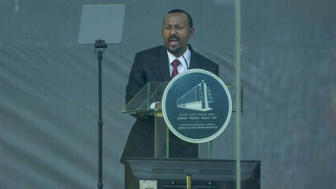 Ethiopia's Prime Minister Abiy Ahmed speaks behind bulletproof glass at his inauguration ceremony. (Photo / AP)