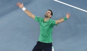 Novak Djokovic of Serbia celebrates his victory in the Men's Singles Semifinal against Jannik Sinner of Italy during day 13 of the 2026 Australian Open at Melbourne Park on January 30, 2026 in Melbourne, Australia. (Photo by Darrian Traynor/Getty Images)