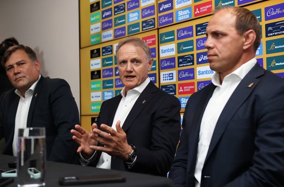 New Wallabies coach Joe Schmidt, flanked by Peter Horne and Phil Waugh, speaks to media during a press conference about his appointment at Allianz Stadium in Sydney. Photo / Photosport