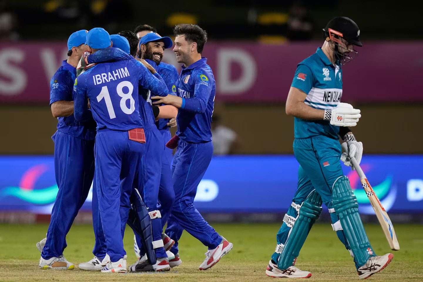 Afghanistan celebrate the dismissal of Daryl Mitchell. Photo / AP