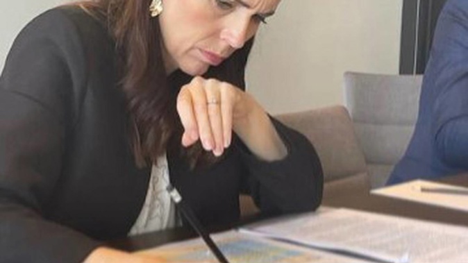 Prime Minister Jacinda Ardern calling Ukrainian President Volodymyr Zelenskyy. (Photo / Supplied)