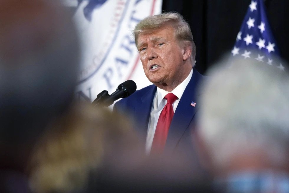  Former President Donald Trump visits with campaign volunteers at the Elks Lodge, July 18, 2023, in Cedar Rapids, Iowa. (AP Photo/Charlie Neibergall, File)