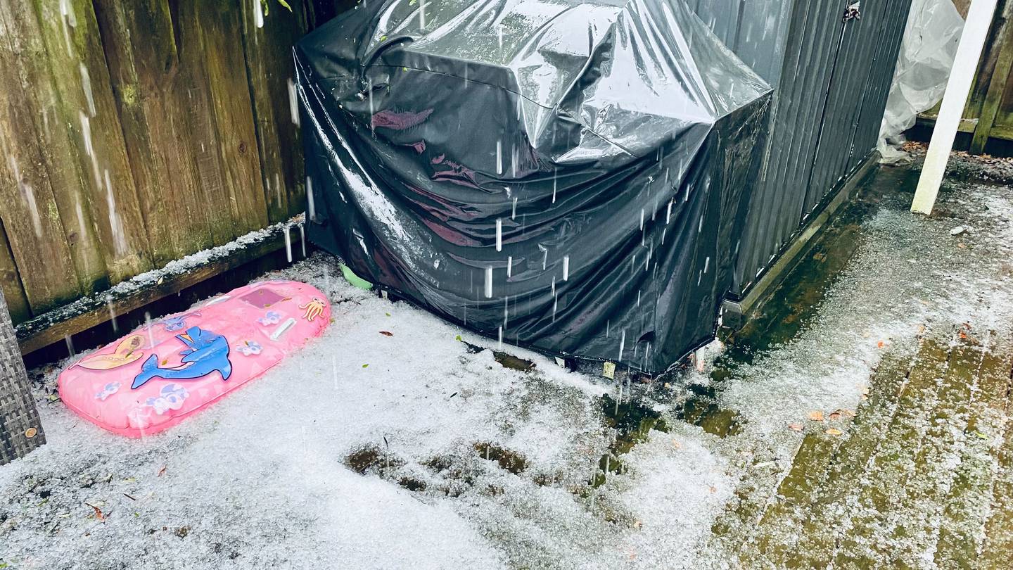 A huge hailstorm has lashed Auckland this afternoon, with squally thunderstorms and heavy rain set to sweep across the city later. Photo / Ella Wilks