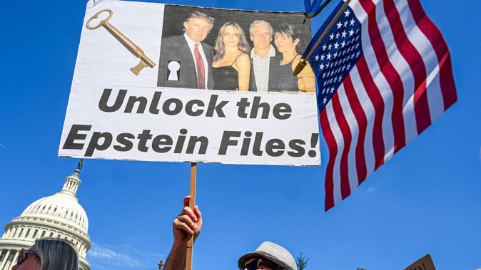 Many people believe Jeffrey Epstein's associates were protected by "deep state" elints and demand release official files. Photo / Roberto Schmidt, AFP
