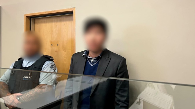 The man, right, was found with more than 100,000 objectionable files on his devices. Photo / Katie Harris