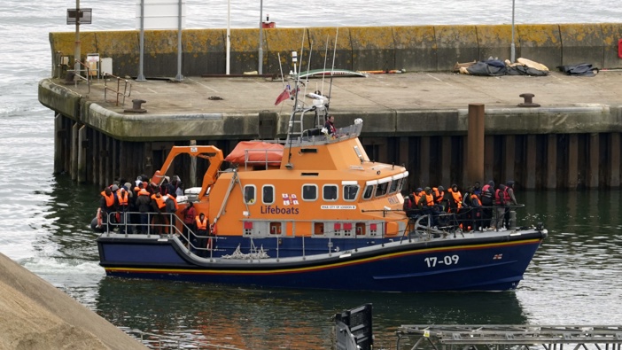 A group of people thought to be migrants are brought in to Dover, Kent, by the Border Force following a small boat incident in the Channel, on Tuesday April 23, 2024. Photo / AP