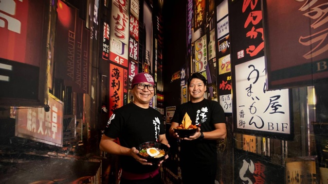 Osamu Honda, Ajisen international chief director (right) and Tomoyoshi Kunitake, Ajisen international manager.