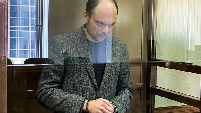 Vladimir Kara-Murza awaits sentencing in a glass cage in the Moscow City Court. Photo / AP