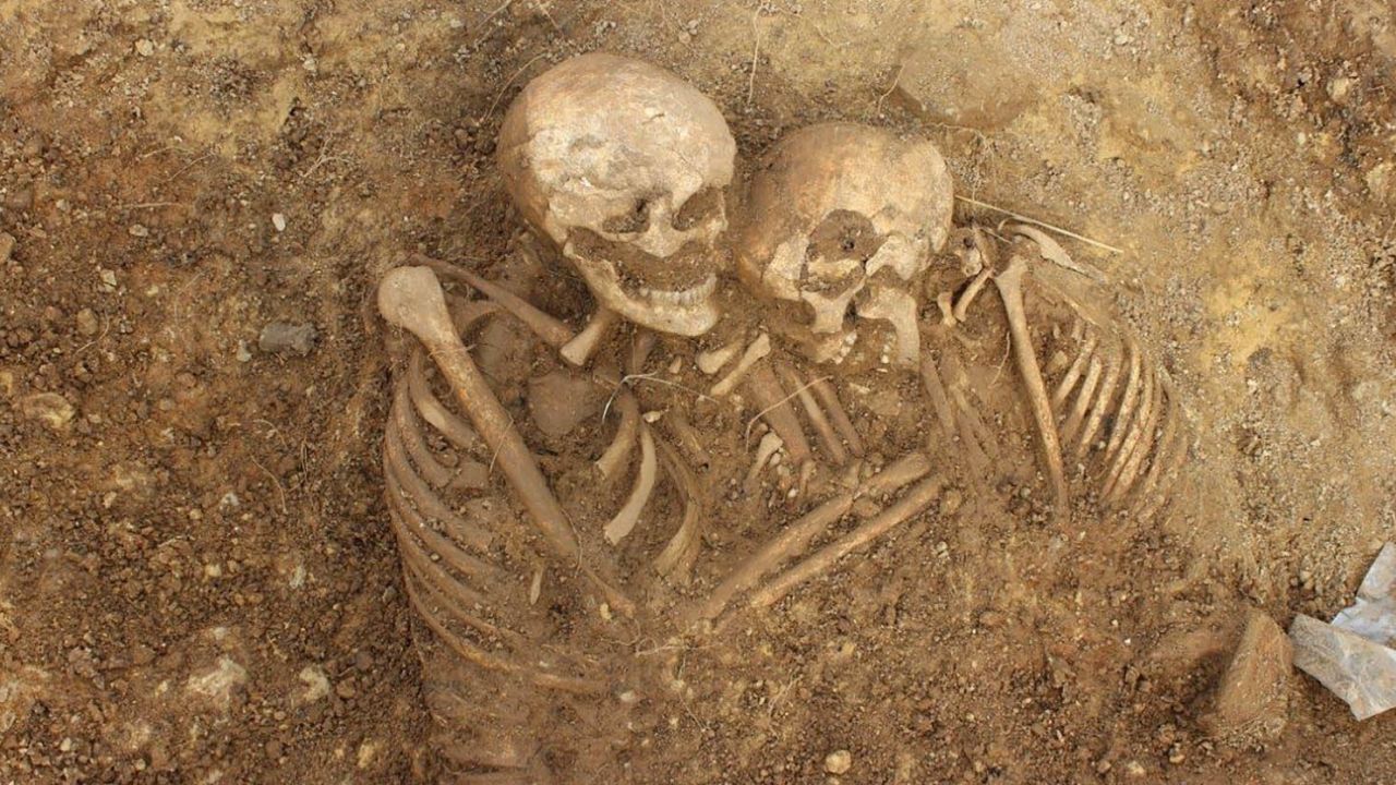 These two skeletons buried together were among the 62 discovered in the previously unknown cemetery.