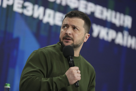 Ukrainian President Volodymyr Zelenskyy answers media questions during his press conference in Kyiv, Ukraine, Sunday Feb. 25, 2024. (AP Photo/Evgeniy Maloletka)