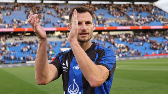 Tommy Smith of Auckland FC greets fans following the round one A-League Men match between Auckland FC and Brisbane Roar at Go Media Stadium, on October 19, 2024, in Auckland, New Zealand. (Photo by Phil Walter/Getty Images)