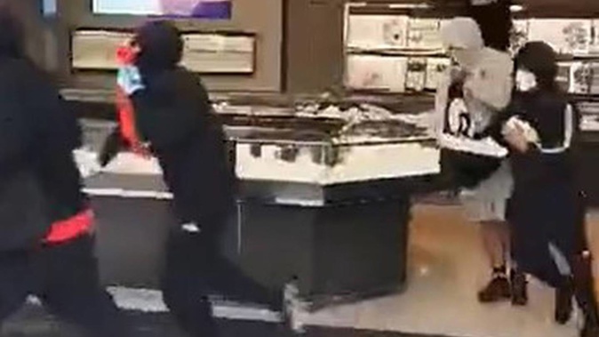 The thieves smashed cabinets and stole jewellery in broad daylight as stunned onlookers watched. Photo / Supplied