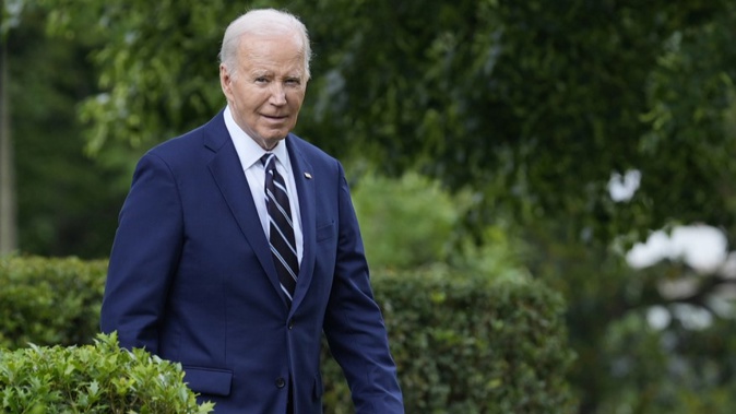 President Joe Biden arrives to speak in the Rose Garden of the White House in Washington, Tuesday, May 14, 2024, announcing plans to impose major new tariffs on electric vehicles, semiconductors, solar equipment and medical supplies imported from China. (AP Photo/Susan Walsh)