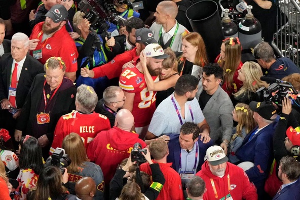 Kansas City Chiefs tight end Travis Kelce (87) hugs his girlfriend Taylor Swift after the team's victory over the San Francisco 49ers. Photo / AP