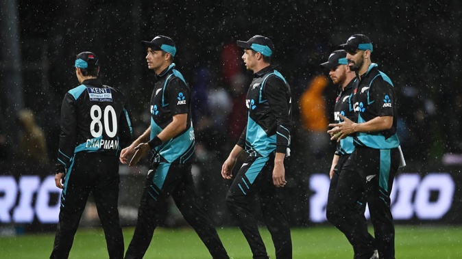 New Zealand leave the field after the rain came down. Photo / photosport.nz