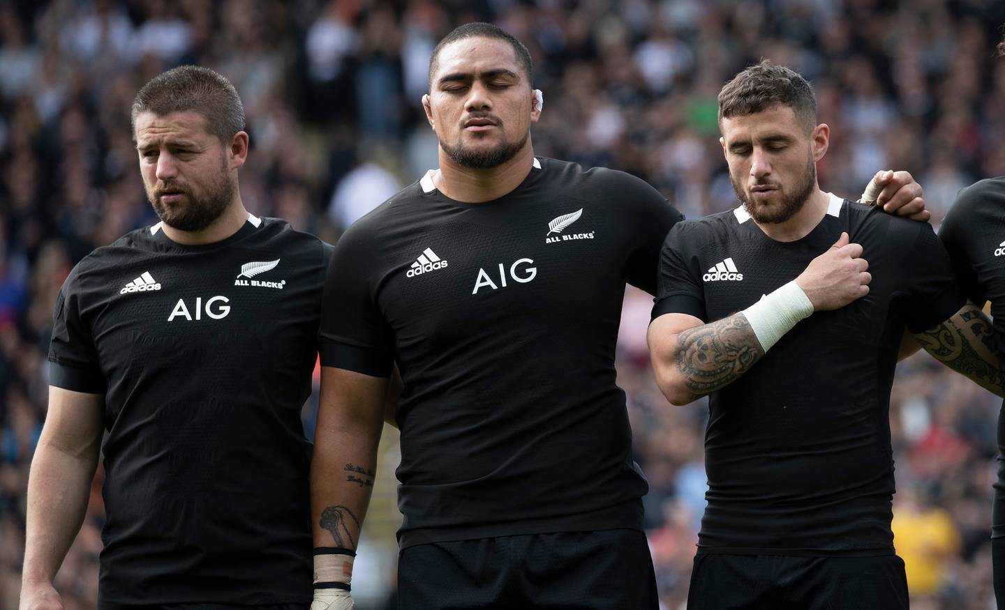 Ofa Tuungafasi (centre) and the All Blacks during the national anthem. Photo / Photosport