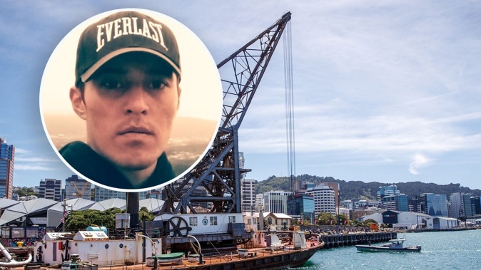 Police and firefighters during their search for Jarreth Colquhoun (inset) who jumped from the floating crane Hikitia on the Wellington waterfront on January 26. Photo / Mark Mitchell