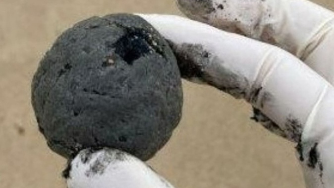 Lifeguards discovered mysterious, black, ball-shaped debris washed along Coogee Beach earlier this week. Photo / Randwick Council