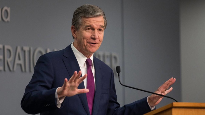 North Carolina Governor Roy Cooper is expected to sign the legislation that would raise the age of marriage from 14 to 16. (Photo / AP)