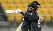 Blair Tickner and Zak Foulkes celebrate the Black Caps' victory over England at Sky Stadium. Photo / Photosport