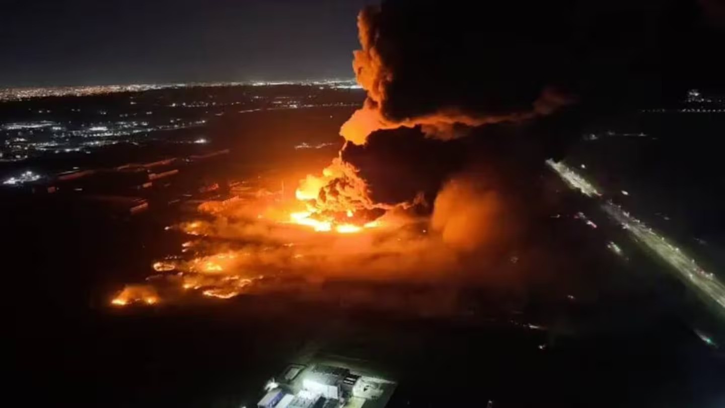 Powerful explosions tore through an industrial park near Argentina's capital, sparking a huge blaze and injuring more than 20 people. Photo / Ministry of Security of the Province of Buenos Aires via AFP