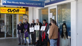 'Good thing I'm wearing an adult nappy': Priests chained to Willis’ office refuse to leave until she meets them