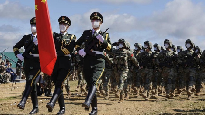 Chinese troops march during the Vostok 2022 military exercise at a firing range in Russia's far east. Photo / AP